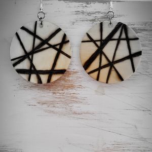 Geometric wood burned design on 2 inch circle earrings